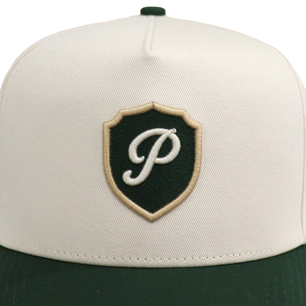 Front crest — The Club Cap by Purist Golf